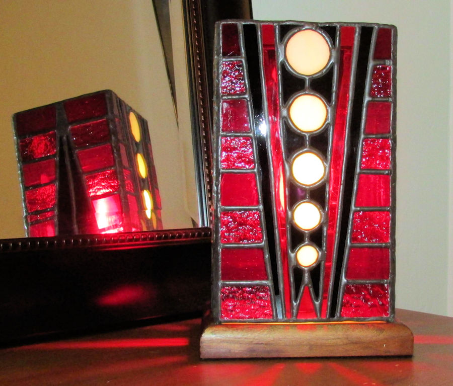 Table Lantern for Andrew, nobody else has one like this!   Circles in stained glass are very difficult, each circle has 4 pieces of glass surrounding it.